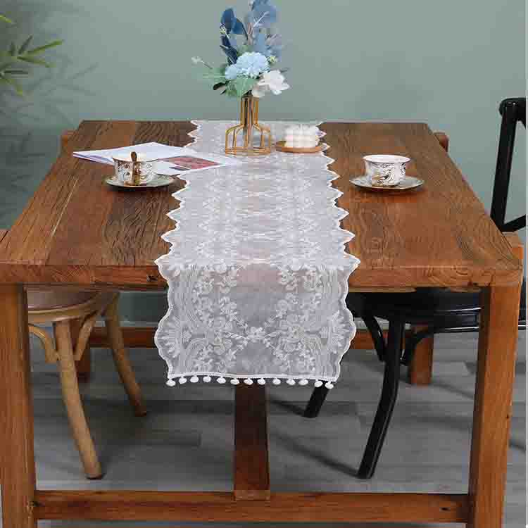 white table runner with tassels